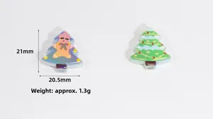 Macro view of Christmas tree acrylic beads with gingerbread man pattern for DIY jewelry