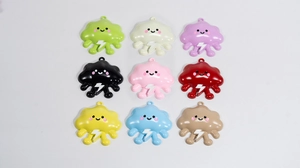 Close-up of colorful alloy cloud charms with lightning and smiley faces for DIY jewelry