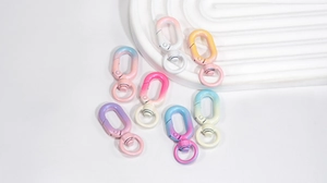 Detail view of colorful macaron gradient alloy lobster clasps with 360-degree swivel rings