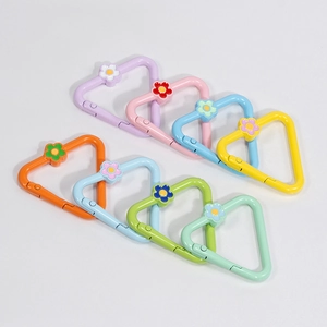 Colorful triangle spring ring carabiners with small flower accents in macaron shades