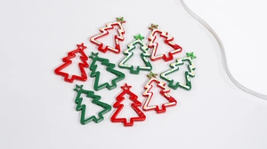 Set of eleven colorful Christmas tree shaped spring snap hooks for DIY festive accessories