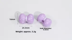 Vue détaillée d'une perle nœud en acrylique violet avec pois blancs pour loisirs créatifs