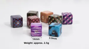 Detailed view of 14mm acrylic cube beads with leopard and checkerboard patterns for DIY