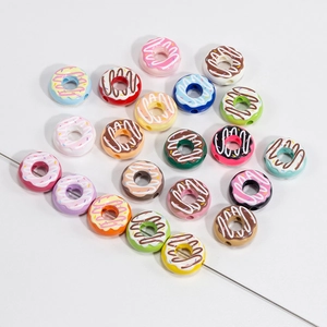 Colorful donut acrylic beads with heart-shaped layout for DIY jewelry making