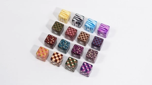 Macro shot of colorful leopard and checkered pattern acrylic square beads for DIY jewelry