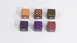 Detail view of colorful acrylic cube beads with grid texture for DIY jewelry making