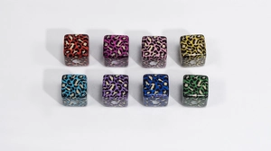 Close-up of colorful leopard print acrylic cube beads for DIY jewelry and crafts