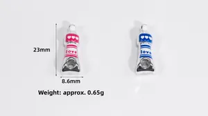 Macro detail of acrylic enamel love tube pendants for DIY jewelry with dimensions