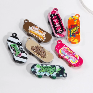 Set of 7 colorful mini finger skateboard charms with street graffiti for DIY keychains
