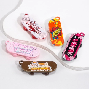 Five assorted colorful acrylic cartoon skateboard charms for keychains and DIY crafts