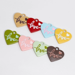Set of eight colorful alloy heart charms with love engraving for DIY jewelry making