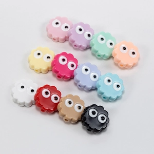 Colorful acrylic beads with cartoon eyes for DIY jewelry making and craft projects