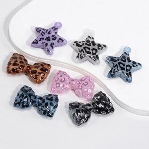 Acrylic leopard print star and bow pendant charms for jewelry making and keychains
