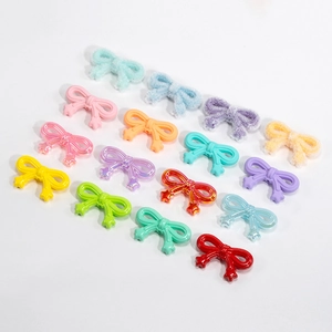 Colorful acrylic bow pendants with star charms for DIY crafts and phone chains