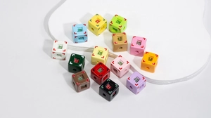 Close-up of colorful acrylic square beads with Chinese characters for DIY jewelry