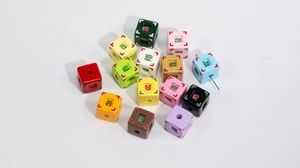 Close-up of colorful acrylic square beads with Chinese characters for DIY jewelry making