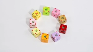 Macro view of colorful acrylic cube beads with Chinese fortune characters for DIY crafting