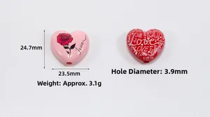 Detail of pink and red heart acrylic beads with Love text and rose pattern for DIY