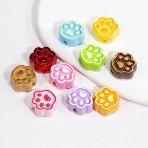 Colorful paw-shaped beads for DIY jewelry making in assorted vibrant candy colors