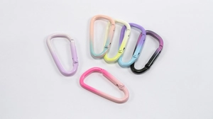 Close-up of 7 colorful gradient D-ring carabiners for DIY keychains and accessories