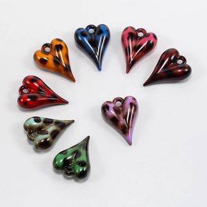 Set of eight colorful leopard print heart pendants for DIY jewelry making and crafts