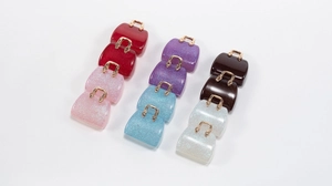 Detailed view of colorful mini acrylic handbag charms for DIY crafts and keychains
