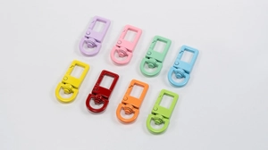Macro shot of 8-color matte finish swivel lobster clasps for DIY jewelry making