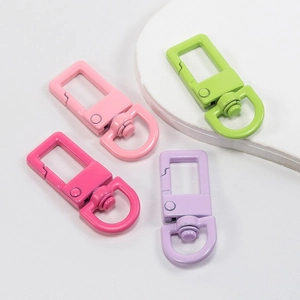 Colorful square metal lobster clasps for DIY crafts and keychains in four bright colors