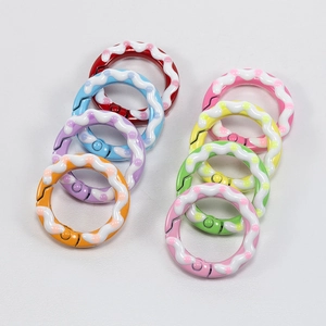 Colorful donut-style enamel spring rings with dots for DIY keychains and accessories
