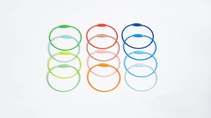 Macro detail of colorful PVC coated stainless steel wire keychains with screw connectors