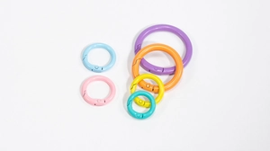 Detailed view of colorful round spring carabiners in various sizes and candy colors