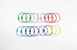 Flat lay of 20 colorful stainless steel wire keychains with secure screw locks for DIY crafts