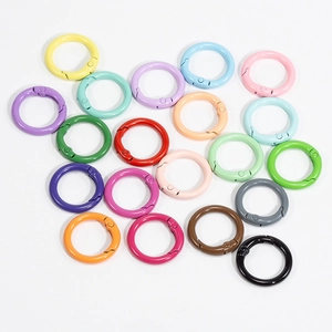 Set of 17 colorful round spring snap hooks in various vibrant painted alloy finishes