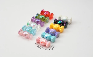 Detailed macro view of colorful candy acrylic beads with AB coating measuring 32mm x 15mm