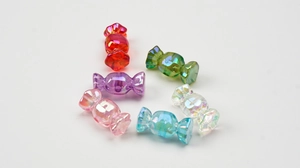 Detail of candy-shaped acrylic beads with rainbow plating for DIY jewelry making