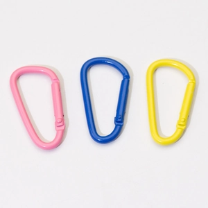Three colorful D-ring carabiners in pink, blue, and yellow with spring gates