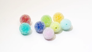 Close-up of colorful jelly sugar beads with bubble texture for DIY jewelry making