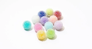 Detailed view of colorful frosted raspberry beads for DIY jewelry and phone chains