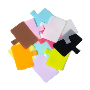 Universal plastic phone tether tabs in multiple vibrant colors for case attachment