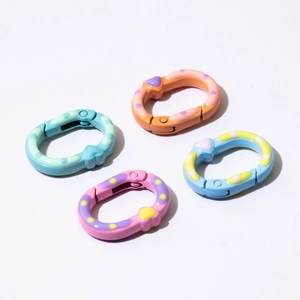 Boucles à ressort ovales macaron colorées avec motifs pois et cœurs pour bricolage