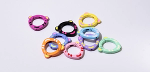 Close-up of colorful tiger-themed animal spring ring buckles for DIY keychains