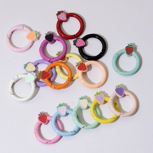 Colorful strawberry spring ring buckles in various candy colors for DIY keychain making