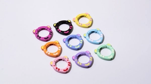 Detailed grid of colorful bear-eared spring ring buckles for DIY keychains and bags