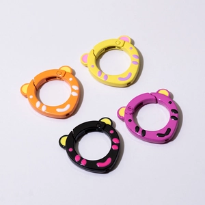 Colorful tiger-ear metal spring rings in orange, yellow, and pink for DIY keychain accessories