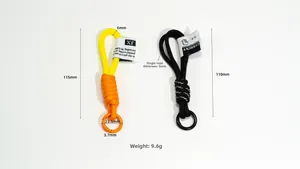Detail of handmade woven paracord keychains with industrial metal rings and size labels