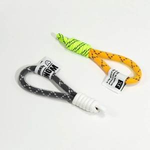 Handmade woven mesh keychain lanyard with paracord knot and decorative fabric tags