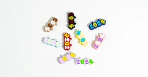Close-up of 2024 colorful resin number charms for DIY keychain and phone strap making