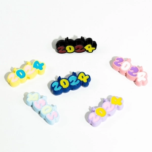Colorful 2024 year charms for shoes and DIY crafts made of durable PVC soft glue