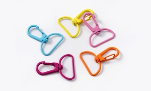 Set of colorful rotating alloy spring snap hooks in blue, yellow, pink, and orange