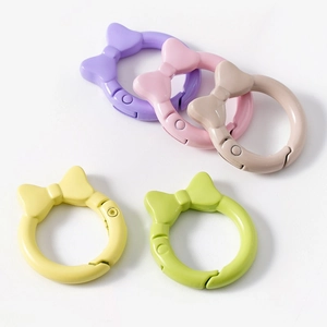 Set di anelli a molla colorati a forma di fiocco per portachiavi e accessori fai da te